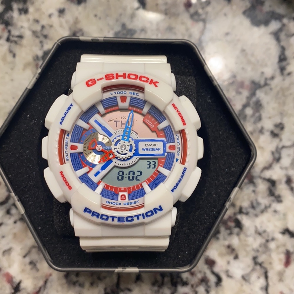 White Gshock with red and blue face